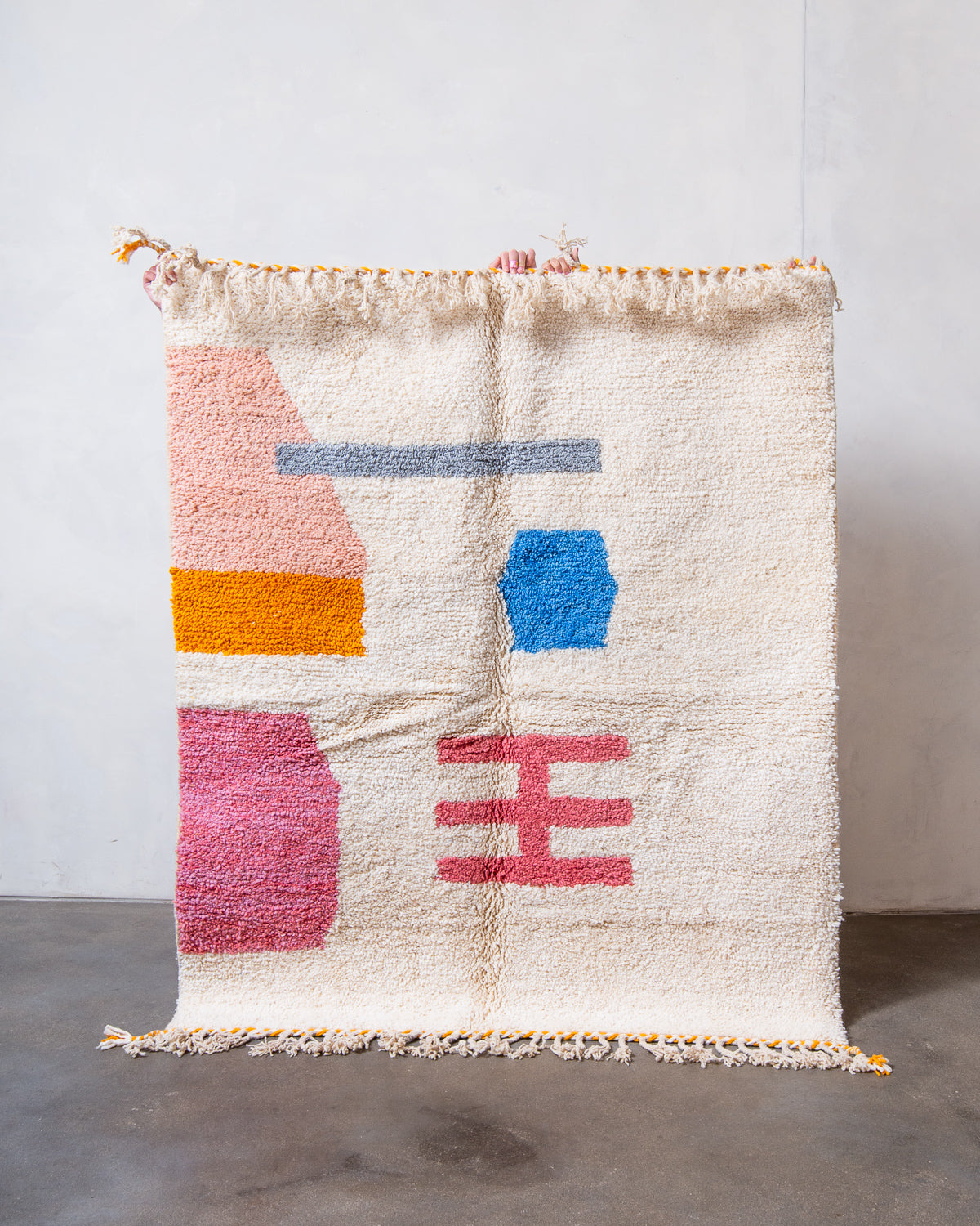 Modern, designer, handcrafted Berber rug from Morocco. Beniourain carpet with beautiful colours and patterns and fluffy wool texture.
